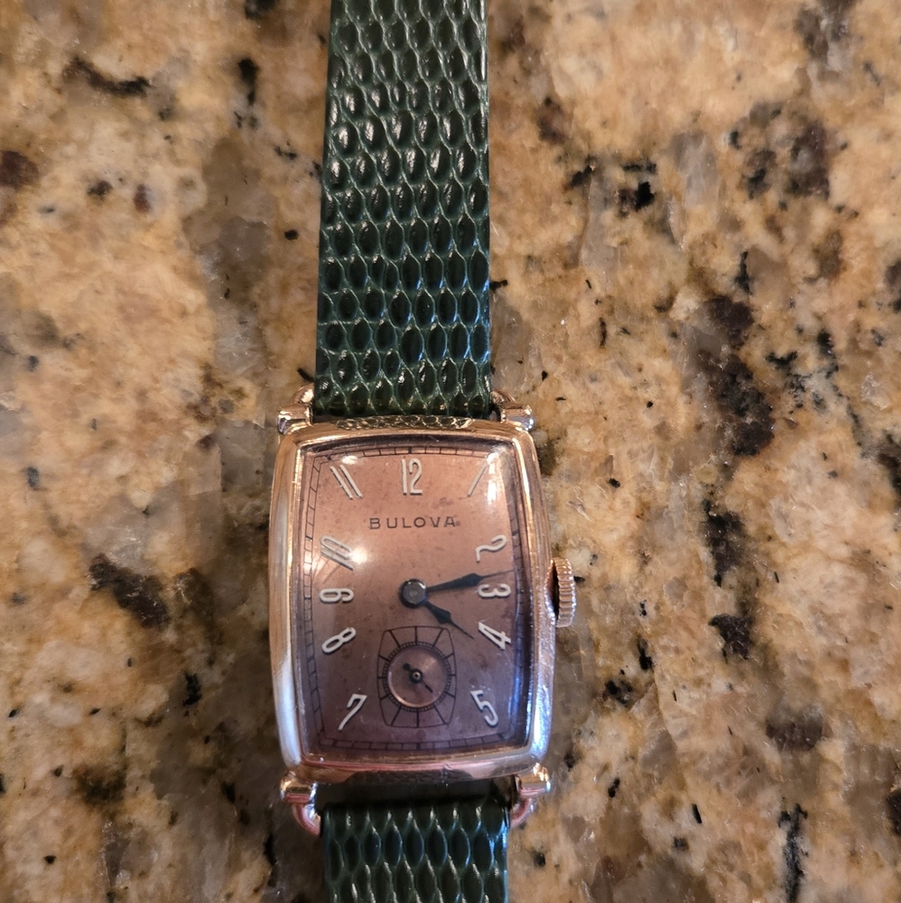 Vintage rose gold rolled watch